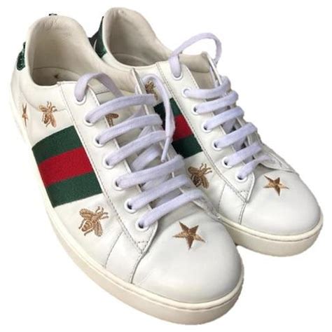 scarpe bianche nere gucci ape bianco nero|Sneaker Ace donna con ricamo ape in pelle bianca .